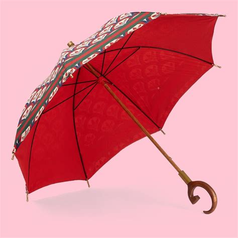 gucci non waterproof umbrella|gucci umbrella pics.